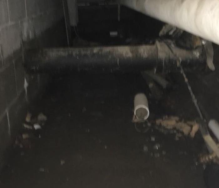 Crawlspace filled with water