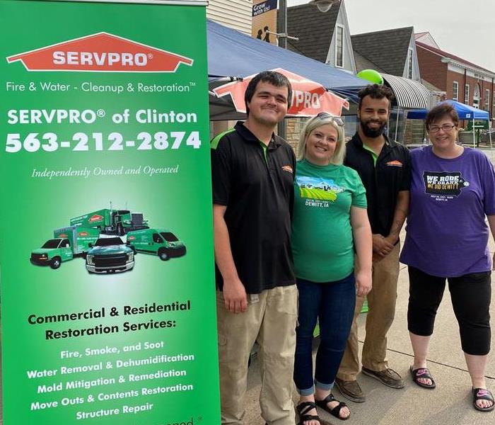 SERVPRO employees standing in front of tent at Ragbrai