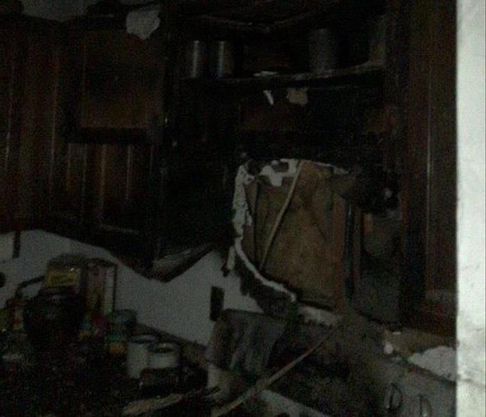 Kitchen that has been effected by a fire