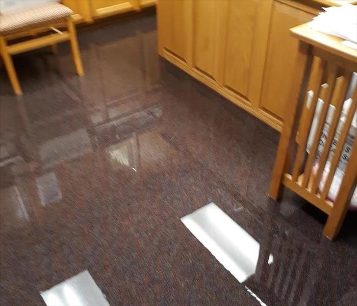 In this image, a sprinkler system had broken in 3 different places due to cold weather causing the main office to flood.
